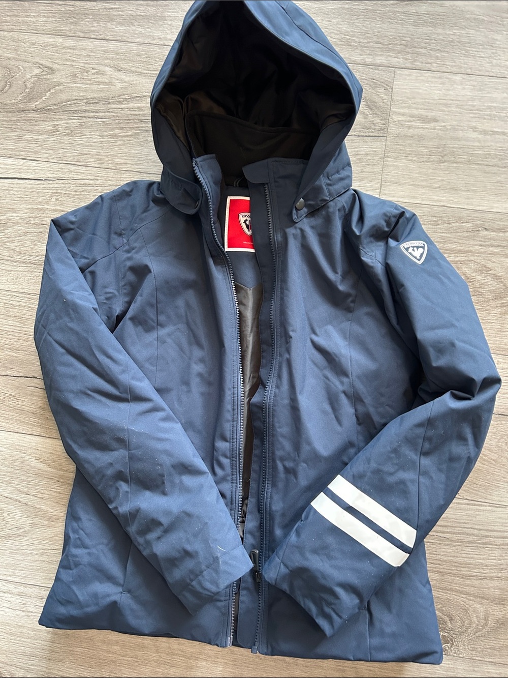 Rossignol Navy Hooded Kids Ski Jacket with White Sleeve Stripes